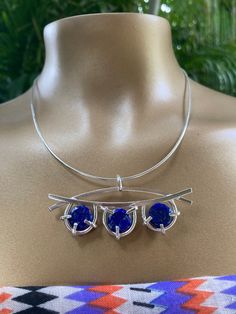 "I handcrafted this sterling silver pendant with 3 lapis lazuli cabochons. It hangs from a sterling silver 16\" omega silver chain with removable end cap. *1 Only* Pendant measures:2.5 inches wide Lapis Lazuli measure: 10mm each Chain measures:16 inches long I make each piece of jewelry, one piece at a time by hand in my studio. Each piece comes wrapped in anti-tarnish paper and placed inside a gray paper box  or metal tin. Perfect for gift giving." Silver Lapis Lazuli Round Pendant Jewelry, Silver Necklace With Round Lapis Lazuli Pendant, Silver Lapis Lazuli Round Pendant Necklace, Silver Lapis Lazuli Necklaces, Nickel-free Silver Lapis Lazuli Necklace, Lapis Necklace, Cabochons Stones, Unique Necklace, Onyx Ring