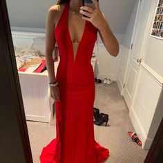 Red Plunge Gown Red Sherri Hill Prom Dress, V-neck Gown For Red Carpet And Prom Season, V-neck Evening Dress For Red Carpet Or Prom Season, Red Backless Formal Gown, Glamorous V-neck Evening Dress For Red Carpet, Elegant Backless Red Carpet Gown, Glamorous Red Carpet Evening Dress With V-neck, Red Carpet V-neck Dress For Prom Season, Red V-neck Maxi Dress For Prom Season