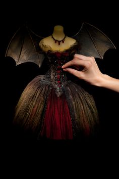 Our 'Bad Black Bat' costume miniature. Photograph by George Chinn. Bat Costume, Miniature Dress, Red Wedding Dress, Ballet Costume, Big Blue Eyes, Silk Tulle, Golden Hair, Cat Woman Costume, Ballet Costumes