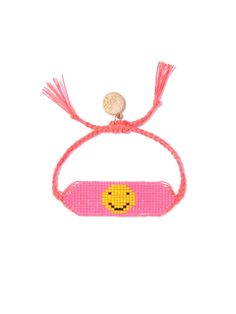 a bracelet with a smiley face on it