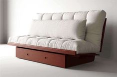 a futon bed with two drawers on the bottom, and a white mattress underneath it