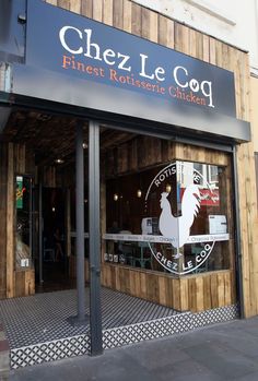 the entrance to cheez le coq restaurant