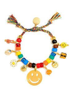 Show the world you've got the universe at your fingertips with our My Own Planet Bracelet! A unique collection of charms -- from bright rainbow glass beads to sparkling pave rhinestones -- create a look that's out of this world! Peace, butterfly, daisy, and smiley charms complete the stellar ensemble, so you'll be the cosmic queen of any room you enter! 6" Adjustable rainbow threadwork Drawstring closure (extendable up to 8") Gold plated brass hardware Glass charms Ceramic charms Pave rhinestone Playful Multicolor Jewelry With Removable Charms, Trendy Multicolor Jewelry With Removable Charms, Whimsical Multicolor Jewelry For Friendship, Adjustable Multicolor Charm Bracelet With Dangling Charms, Fun Multicolor Charm Jewelry, Adjustable Multicolor Jewelry With Dangling Charms, Adjustable Multicolor Jewelry With Removable Charms, Playful Bracelet Jewelry For Jewelry Making, Rainbow Charms Bracelet As A Gift