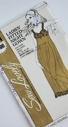 an old fashion sewing book with the title ladies's evening gown written on it