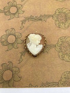 Vintage Heart Cameo  Brooch Pendant 1 inch wide 1.25 inches tall We Will Insure Your Package For Full Value Message us with any questions Victorian Cameo Brooch For Anniversary, Heirloom Cameo Brooch Gift, Heirloom Cameo Brooches As Gift, Heirloom Cameo Brooches For Gifts, Vintage White Pendant Brooches, Heirloom Brooches With Cabochon For Gifts, Antique Heart Brooch For Wedding, Antique Heart-shaped Wedding Brooch, White Antique Brooches As A Gift