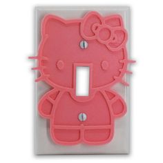 a pink hello kitty light switch plate cover