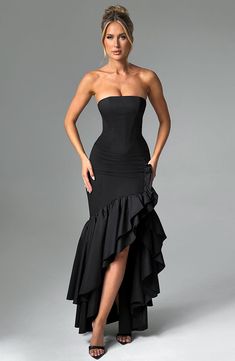 Enter your soft girl era in the Angelina black maxi dress, crafted in our luxury non-stretch cotton that hugs the body for the silhouette of dreams. This strapless design is complete with a voluminous frilled high low skirt that's super pretty and playful. Ruffle Long Dress, Club Party Dresses, Strapless Maxi, Bodycon Maxi Dresses, Backless Design, Ruffled Maxi Dress, Midi Dress Sleeveless, Party Dresses For Women, Black Maxi Dress