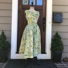 "1950s Floral Dress, Mid Century Cocktail Dress, Summer Spring Garden Party Be prepared to have all eyes on you. Excellent for your next wedding or any occasion where glamour is required. Pair this with a chiffon up-do, some dramatic earrings. Oh, and a pair of sunglasses for when the paparazzi descends upon you and a million flashes go off. Beautiful Mid Century formal cocktail dress made of a lightweight taffeta. A lovely flowing skirt with satiny under slip and another muslin slip for body, m Yellow Vintage Dress For Garden Party, 1950s Style Yellow Dress For Garden Party, 1950s Style Vintage Dress For Garden Party, 1950s Spring Vintage Event Dress, Yellow 1950s Style Dress For Garden Party, Vintage Dress For Garden Party, 1950s Style Dresses For Spring Vintage Events, 1950s Style Vintage Dress For Spring Garden Party, Vintage Yellow Dress For Garden Party