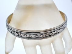 Vintage Fine Jewellery - This is a round sterling silver bangle bracelet with a braided design. It is hallmarked 925, weighs 24.5 grams, .38" wide, very well made. Traditional Silver Braided Bangle Bracelet, Silver Engraved Braided Bangle Bracelets, Engraved Silver Braided Bangle Bracelets, Silver Braided Bangle Bracelets, Silver Bangle Bracelet, Vintage Fine Jewelry, Sterling Silver Bangle Bracelets, Sterling Silver Bangle, Silver Bangle Bracelets