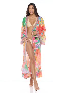 A vibrant tropical-inspired pattern enlivens this vacation-ready duster framed with three-quarter ruffle sleeves. 52" length (size One Size) Open front Three-quarter sleeves 100% polyester Hand wash, dry flat Imported Spring Long Sleeve Pool Cover-up, Vibrant Spring Vacation Cover-up, Spring Tropical Print Cover-up, Tropical Style Swimwear For Spring Brunch, Tropical Swimwear For Spring Brunch, Tropical Long Sleeve Beach Season Cover-up, Tropical Multicolor Cover-up For Resort Season, Tropical Multicolor Cover-up For Resort, Spring Tropical Print Cover-up For Beach Party