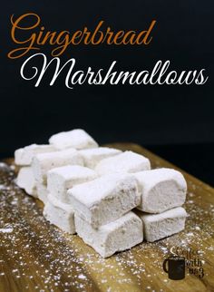 white marshmallows on a wooden cutting board with the title gingerbread marshmallows