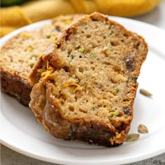 two slices of banana bread on a white plate