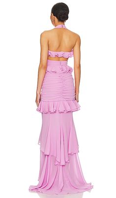 Find MAJORELLE Jerry Gown In Pink on Editorialist. MAJORELLE Jerry Gown in Pink. - size M (also in S, XL, XXS) MAJORELLE Jerry Gown in Pink. - size M (also in S, XL, XXS) Elevate your evening look with the MAJORELLE Jerry Gown in Lilac Pink. Made from luxurious georgette fabric, this gown boasts playful ruffle trim for a fun and frilly touch. Whether it's a special event, gala, or a night on the town, embrace the whimsical elegance of this gown and make a statement in lilac pink.. Self: 100% pol 8th Grade Prom, Debut Dresses, Travel Fits, Elegant Dressing, Prom Dresses Long Pink, Quince Dress, Light Pink Dress, Frilly Dresses, Designer Evening Gowns