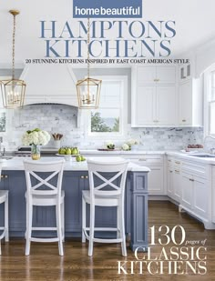 the cover of home beautiful magazine features white kitchen cabinets and blue island with bar stools