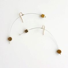 AIR MOBILE EARRINGS No. 2 | modern jewelry, gold earrings, dangle earring, silver earrings, minimalist jewelry, mobiles, geometric earring | by HyworksLA on Etsy https://www.etsy.com/listing/513379457/air-mobile-earrings-no-2-modern-jewelry Modern Linear Earrings For Everyday Wear, Modern Plug Earrings For Everyday, Modern Everyday Plug Earrings With Ear Wire, Modern Plug Drop Earrings With Ear Wire, Minimalist White Threader Earrings For Everyday, Modern Geometric Ear Wire Earrings, Minimalist White Linear Earrings For Pierced Ears, Minimalist Single Plug Earring, Modern Dangle Plug Earrings