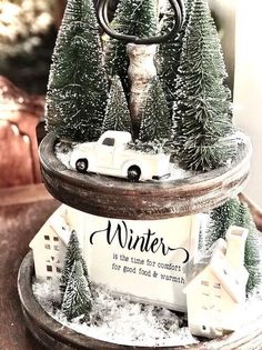 a christmas tree stand with cars and trees on it