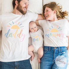 Celebrate your baby's 1st trip around the sun and wear these matching boho-inspired sunshine birthday shirts for the whole family! SHIRT DETAILS * Bella+Canvas - Adult, Youth, and Toddler shirts * Rabbit Skins - Baby shirts and bodysuits * Next Level - Women's tank tops * Gildan - alternative option if the primary brand is out of stock * 100% soft cotton SIZING * Our shirts are unisex - Run true to size and have a relaxed fit. Order one size smaller for a further slim fit. * If you are unsure about what size to order, please refer to the size chart in the photos or reach out to us. * To measure, lay your favorite shirt flat. Measure armpit to armpit and the length, then compare to the size chart in the photos. * Incorrect size can not be refunded or exchanged. DIRECT TO GARMENT PRINTING (D Playful Multicolor T-shirt For First Birthday, Multicolor Casual Top For First Birthday, Casual Multicolor Tops For First Birthday, Fun Multicolor T-shirt For First Birthday, Playful Top For Gender Reveal In Summer, Fun Cotton T-shirt For First Birthday, Playful Summer Tops For Gender Reveal, Playful Tops For Summer Gender Reveal, Cute Summer Tops For Gender Reveal