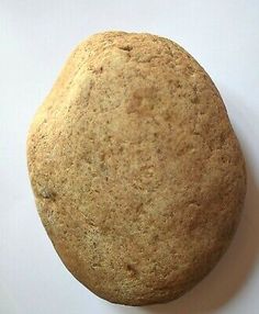 a round cookie sitting on top of a white table