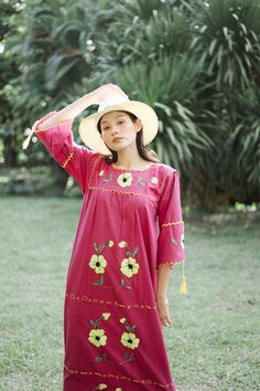 "Vintage Mexican Maxi Dress with Floral Hand Embroidery in Shade of Ruby Red. Features hand embroidered flowers on chest front, neck and sleeves. Half Sleeve drawstring at cuff sleeves. Cotton Blend Polyester Condition: Very Good Vintage Condition. BEST FIT = M Please be sure to check the measurements to insure a perfect fit. Details and Measurements (Inch) BUST: 38 \" HIPS: 46 \" FULL LENGTH: 56 \" SLEEVE LENGTH: 14 \" Our model is 165 cm height 52 kg weight 33 bust 27 Waist 35 Hip in inch **FR Traditional Red Embroidered Spring Dress, Traditional Red Embroidered Dress For Spring, Long Sleeve Floral Embroidered Dress For Vacation, Red Long Sleeve Folk Embroidered Dress, Red Folk Style Embroidered Long Sleeve Dress, Folk Style Embroidered Dress For Spring, Spring Long Sleeve Dress With Embroidered Border, Red Long Sleeve Dress With Embroidered Sleeves, Red Folk Embroidered Dress For Spring