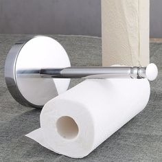 two rolls of toilet paper sitting next to each other