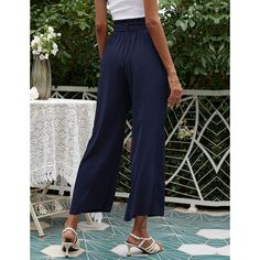 Navy Blue High Waist Cropped Pants with Tie Blue Ankle-length Solid Color Bottoms, Spring Navy Pants With Elastic Waistband, Navy High Waist Casual Pants, Chic Solid Blue Pants, Chic Blue Solid Color Pants, Casual High Waist Navy Pants, Casual Navy Bottoms For Spring, Navy Wide Leg Bottoms For Spring, Navy Wide-leg Pants For Spring