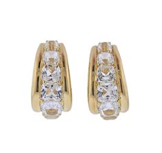 Pair of brand new Seaman Schepps 18k gold Madison buckle earrings with 11.65ctw in white topaz, the buckles are removable. Come with packaging. DESIGNER: Seaman Schepps MATERIAL: 18k Gold GEMSTONES: Topaz DIMENSIONS: Earrings are 38mm long, buckles are detachable. Earrings measure 22mm x 12mm without buckles. WEIGHT: 29.5 grams MARKED/TESTED: 750, Shell mark, 247440, 247401. CONDITION: Brand New Luxury Formal Clip-on Huggie Earrings, Luxury Clip-on Huggie Earrings For Formal Occasions, Formal Gold Earrings With White Topaz, Gold White Topaz Earrings For Formal Occasions, Luxury Diamond White Channel Set Earrings, Luxury Diamond White Earrings With Channel Set, Luxury Cubic Zirconia Channel Set Earrings, Luxury White Topaz Earrings For Anniversary, Luxury Diamond White Huggie Earrings For Formal Events