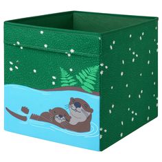 an animal themed storage box with stars and trees on the sides, featuring two otters