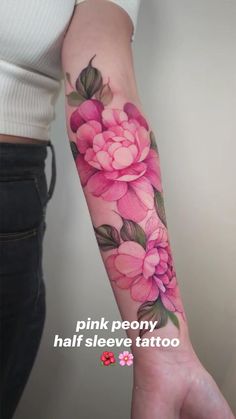 a woman's arm with flowers on it and the words pink peony half sleeve tattoo