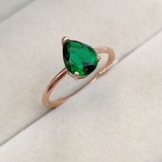 Pear Cut Emerald Solitaire Ring, 14k Solid Gold Tear Drop Minimalist Green Emerald Ring, Solitaire Ring, Promise Ring, Gift For Her, Unique --->Ring details: - Theme: Solitaire & Engagement - Metal Type: Sterling Silver, White Gold, Rose Gold , Yellow Gold - Gemstone creation: Simulated (Hydrothermal Lab Grown Green Emerald) - Accented stones: Cubic Zirconia - Color: Green - Ring Size: I offer more than one (Contact us if your ring size is not available in the listing) - Gemstone Size:- Main Sto Emerald Engagement Ring Pear Cut, Emerald Engagement Ring Pear, Emerald Green Ring, Ring Board, Emerald Solitaire Ring, Jade Design, Emerald Rings, Green Emerald Ring, Green Ring