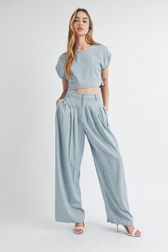 This Solid Crop Top & Pleated Wide Leg Pants set is a must-have for any formal occasion. With its simple and classic design, it offers an effortless yet elegant look. The short sleeve crop top and wide leg pants provide a comfortable fit, while the pleated details add a touch of sophistication. Perfect for any fashion-forward individual. evercado.com Solid Crop Top, Simple Crop Top, Top And Wide Leg Pants, Pleated Wide Leg Pants, Short Sleeve Crop Top, Short Sleeve Cropped Top, New Tops, Contemporary Fashion, Formal Occasion