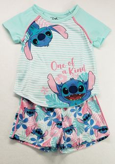 Disney Stitch "One Of A Kind" 2-Piece Pajama Set Girls' Size 4/5 Brand new with tags Smoke free home The galaxy's most adorable alien pet adds a one-of-a-kind touch to her sleepwear with this  Stitch 2-Piece Pajama Set, featuring cute Stitch print pj shorts and a cozy sleep shirt. 2-piece sleep set includes: 1 sleep shirt and 1 pair of shorts Tee: Crewneck; short sleeves;  Stitch graphic print Shorts: Pull-on styling; elastic waistband; Stitch print  Flame retardant  ©Disney, All Rights Reserved Playful Green Sets With Character Print, Cute Bedtime Sets With Character Print, Cute Sets With Character Print For Playwear, Cute Playwear Sets With Character Print, Cute Character Print Playwear Sets, Cute Sleepover Sets With Character Print, Stitch Shorts, Stitch Pajamas, Lilo And Stitch Merchandise