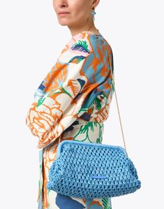 Loeffler Randall's Trudie bag is the perfect finishing touch for all of your favorite warm weather ensembles. The roomy clutch is crocheted from woven raffia and finished with a detachable crossbody strap for endless styling options. Pair it with sleek separates and airy sundresses to add emphasis to your favorite seasonal looks. Summer Blue Clutch, Blue Woven Clutch Bag, Raffia Crochet Clutch Pattern, Luxury Handmade Crochet Clutch Bag, Luxury Raffia Bag, Valentines Frames, Frances Valentine, Skirt And Top Dress, Work Accessories