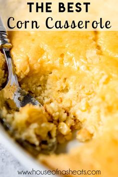 a close up of a casserole dish with a spoon in it