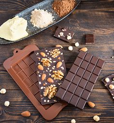 chocolates and nuts on a wooden table