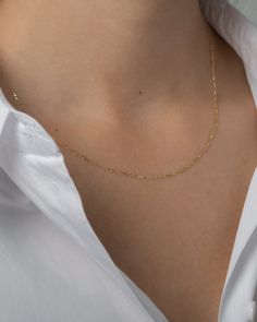 14k solid gold baby figaro cable link chain necklace available in your choice of length and gold color. Chain: Approx. 1mm(W) Weight: 16" is approx. 1 gram Comes gift ready Delicate Figaro Link Chain Necklace, Delicate Figaro Chain Necklace As Gift, Delicate Figaro Chain Necklace For Gift, Dainty 14k Gold Figaro Chain Necklace, Dainty Figaro Chain Necklace, Dainty Figaro Chain Necklace As Gift, Delicate Yellow Gold Figaro Chain Necklace, Delicate 14k Gold Necklace With Figaro Chain, Minimalist 14k Gold Figaro Chain Necklace