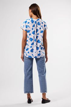 Polished yet relaxed, the Renata is one of our best-selling styles — the epitome of effortless dressing. Now in a custom print inspired by artist Sonia Delaunay.Short-sleeved, v-neck blouse with single shell-button closure and relaxed fit100% FSC-Certified Viscose Crepe from sustainably managed forests28 1/2" in LengthEthically Made in China V-neck Viscose Blouse With Floral Print, Printed Viscose V-neck Blouse, V-neck Blouse With Abstract Print, Blue Vibrant Print V-neck Top, Multicolor Abstract Print V-neck Blouse, Crepe Blouse, Sonia Delaunay, Blue V, V Neck Blouse