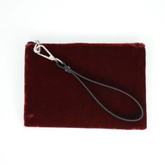 Solid colored silk velvet in the perfect wallet size, with an added detachable leather wristlet strap. Measures 7.5" x 5", Silk Velvet, Spot Clean. Handmade in Portland, Oregon. Rectangular Leather Wristlet For Evening, Evening Clutch With Wrist Strap, Chic Everyday Clutch With Wrist Strap, Evening Clutch Wristlet, Chic Clutch With Wrist Strap For Everyday Use, Elegant Handheld Clutch With Wrist Strap, Chic Zipper Pouch Wristlet, Elegant Evening Clutch Wristlet, Elegant Rectangular Wristlet For Evening