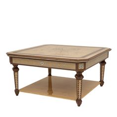 a coffee table with an intricately decorated top and wooden legs, on a white background