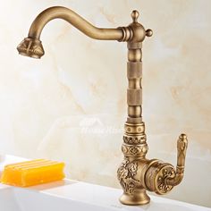 an old fashioned faucet is shown with soap