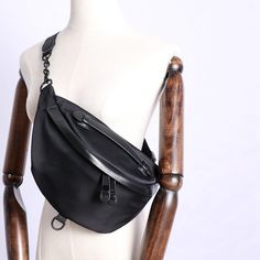 Overview:Design: Womens Black Nylon Leather Fanny Pack Nylon Chest Bag Womens Hip Bag Waist Bag For WomenInclude: A Chest BagCustom: NoLeather: Cowhide, Nylon Measures: 30cm x 18cm x 12cm / 28cm x 17cm x 11cmWeight: 0.38kgSlots: 1 zip main slots, 1 phone slot, 1 inner slot, Accessories(option): NoneStyle: Womens Black Nylon Leather Fanny Pack Nylon Chest Bag Womens Hip Bag Waist Bag For WomenVery durable (At least 5 Years) and it should last a life time Note:Each Item will have very slight varia