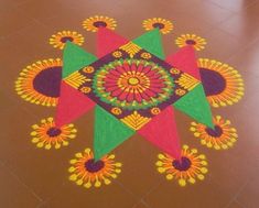 a colorful flower design is on the floor