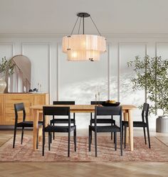 a dining room with a table and chairs