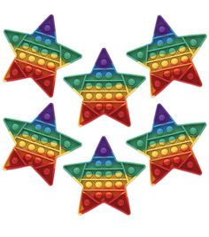 six star shaped magnets with different colors and shapes