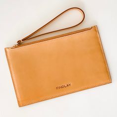 Chic and minimalist, the Slim Zip Wallet fits all the essentials for your "on the go" lifestyle. Crafted in smooth, buttery soft and sweet smelling leather. This wallet works great tossed inside a Findlay Tote or Crossbody, but also great to carry on its own for a night out on the town. Interior includes 1 large cash pocket and 4 card pockets that can fit 1-2 cards each. Also fits most mobile phones. - Smooth Full Grain 100% traceable Italian Vegetable-Tanned leather - Color - Natural Vachetta - Star Outline, Italian Vegetables, Zip Wallet, Shopping Tote Bag, Shopping Tote, Leather Care, Vegetable Tanned Leather, Clutch Wallet, Mobile Phones