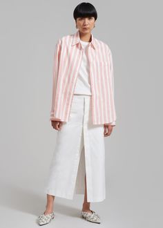 Color: Pink Stripe Crisp shirting fabric Oversized fit Pointed collar  Button front closure Single patch chest pocket Button cuffs Curved semi high-low hem 100% Cotton  Machine Wash Cold  By The Frankie Shop. Imported Oxford Shirt Outfit, Denim Suit, Shirting Fabric, The Frankie Shop, Frankie Shop, Black Cargo Pants, Paris Woman, Wide Stripes, Black Cargo