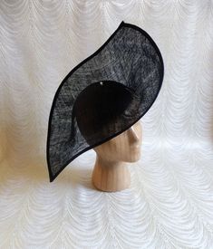 "One large sinamay straw hatinator base in black in an oblong shape that measures approximately 13\" at its widest point and approximately 16 - 17\" at its longest point. Deep curvature to fit against your head. The stiffened sinamay straw is feather light but has a great sturdy weave that provides excellent support for your millinery creations. Edge finished with sinamay. Shipped in an oversized box, hence the higher than normal postage charge. May have to ship separately for some international Diy Fascinator, Hat Form, Blank Hats, Millinery Supplies, Hat Base, Guys And Dolls, Diy Hat, Feather Light, Blue Hat