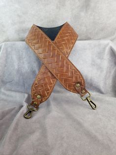 "Please visit our Etsy shop at:  https://alforddesignsltd.etsy.com and check out our large assortment of leather replacement straps - lots of colors, and textures for bags, purses,  briefcases, and more! Brandy/ honey-colored Embossed braided genuine cowhide leather(Please note that this is a 2\" wide strap in the photo). Introducing our exquisite Custom Made Genuine Embossed Cowhide Leather Cut-Resistant Replacement Straps, that include sophistication, strength, and style. Crafted with utmost p Custom Strap, Leather Cuts, Visual Texture, Purse Strap, Bags Purses, Wide Straps, Crossbody Purse, Bag Straps, Embossed Leather