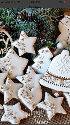 some decorated cookies sitting on top of a table