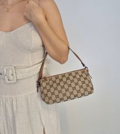 Gucci GG Beige/brown Canvas Mini Pochette Jacqard x Leather handbag. Comes in a great condition, with very little signs of patina. Leather strap has some scratches and signs of wear. Hardware looks great, zipper works well. Interior new Measurements: Height: 12 cmWidth: 20 cmDepth: 10 cmStrap: 15 cm Recommendation: Use Carbon Pro Protector or Leather cream to water proof the leather and protect it from dirt. Brown Canvas, Diaper Backpack, Vuitton Bag, Beige Brown, Exclusive Bag, Casual Backpack, Water Proof, New Bag, Leather Handbag