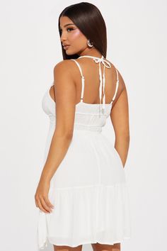 Available In Navy And Off White. Mini Dress Scoop Neck Adjustable Spaghetti Straps Neck Tie Smocked Waist Lined Self: 100% Rayon Lining: 100% Polyester Imported | Raveena Mini Dress in Off White size Small by Fashion Nova Sleeveless Beach Camisole With Built-in Bra, White Sleeveless Mini Dress With Straps, Sleeveless Sundress With Built-in Bra For Vacation, Halter Neck Camisole For Beach With Straps, Beach Halter Neck Camisole, Halter Neck Camisole With Straps For The Beach, Delicate Straps Sleeveless Sundress For Vacation, Sleeveless Sundress With Delicate Straps For Vacation, Summer Mini Dress With Delicate Straps